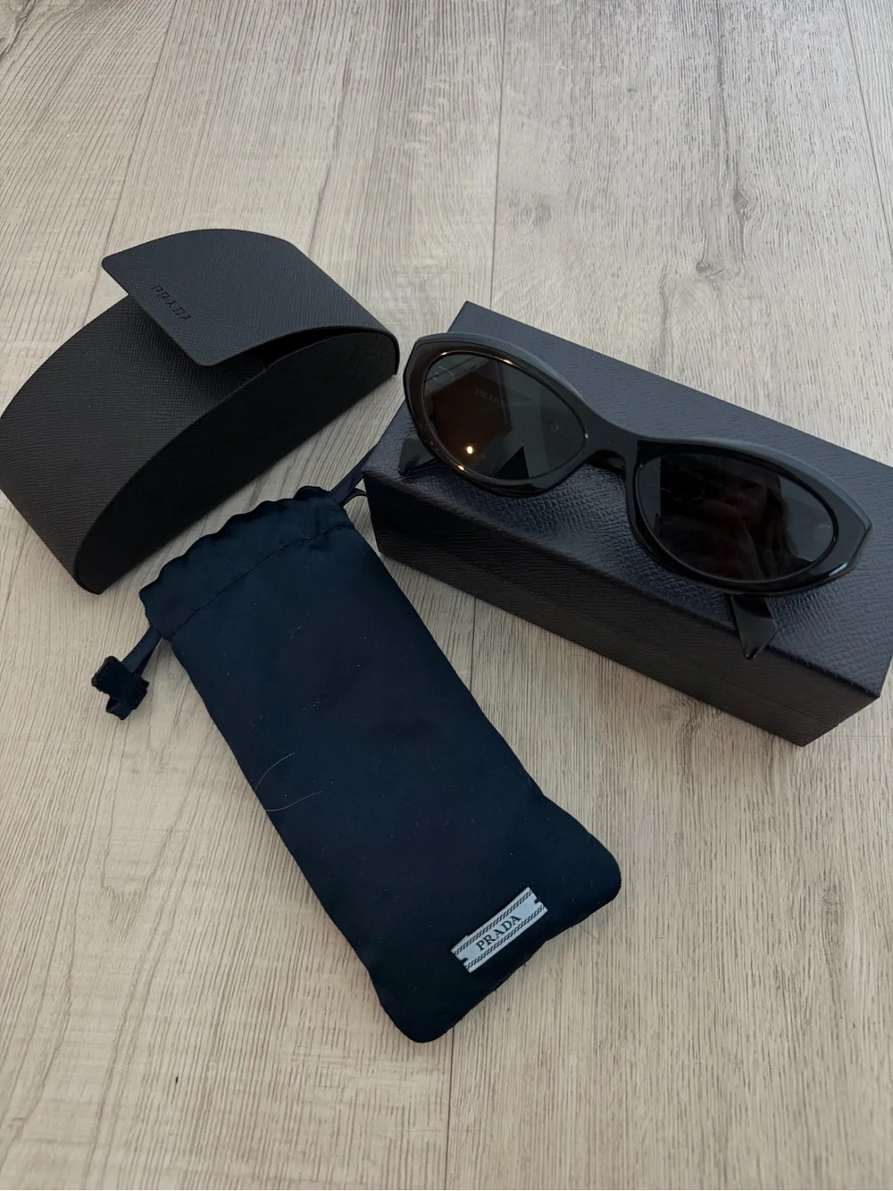 Prada Symbole Black Oval Sunglasses